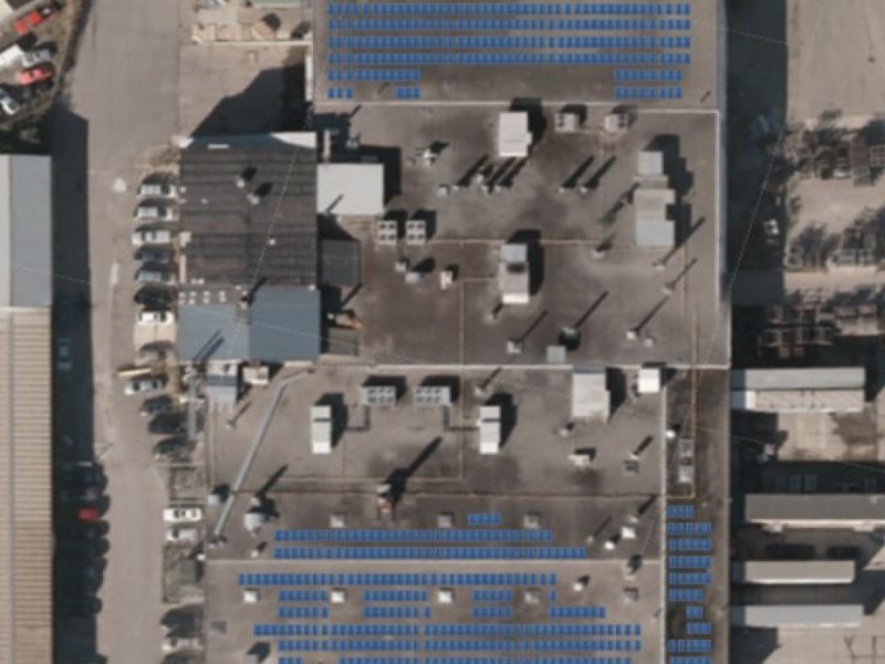Butcher Finishing Arial View of rooftop solar panels