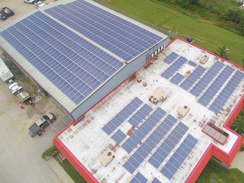Joint Operation Centre Aerial View of Building with rooftop solar panels installed by Solera